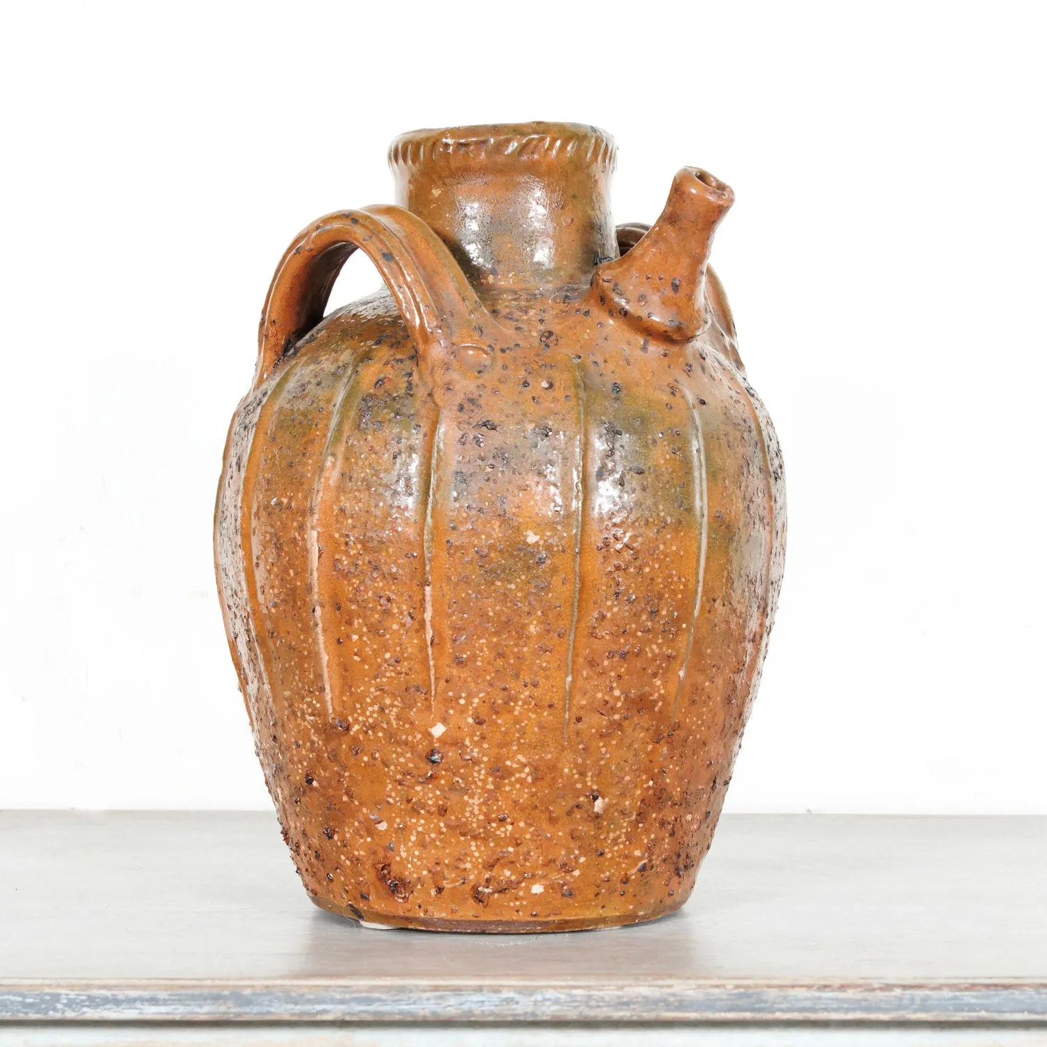 Rare 19th Century French Terracotta Walnut Oil Jug with Orange Glaze