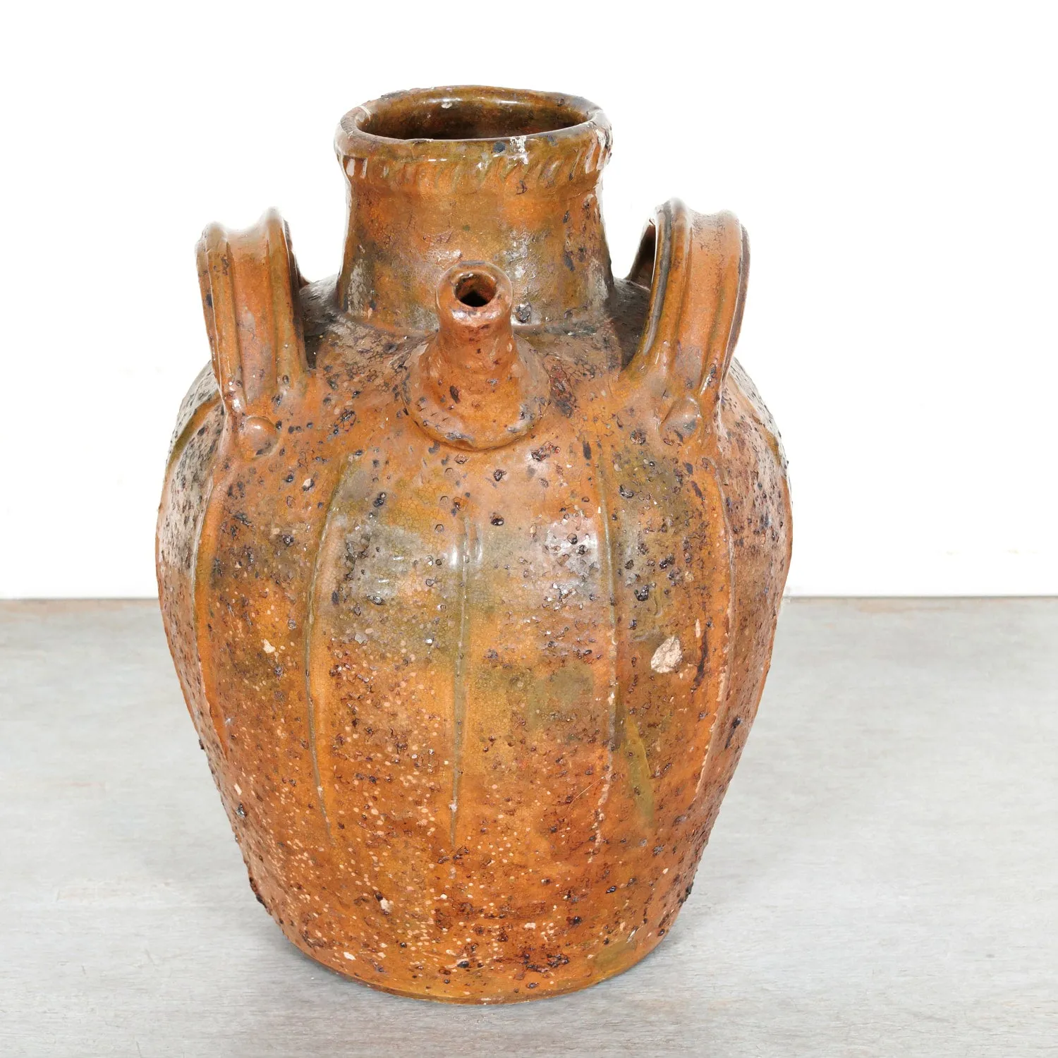 Rare 19th Century French Terracotta Walnut Oil Jug with Orange Glaze