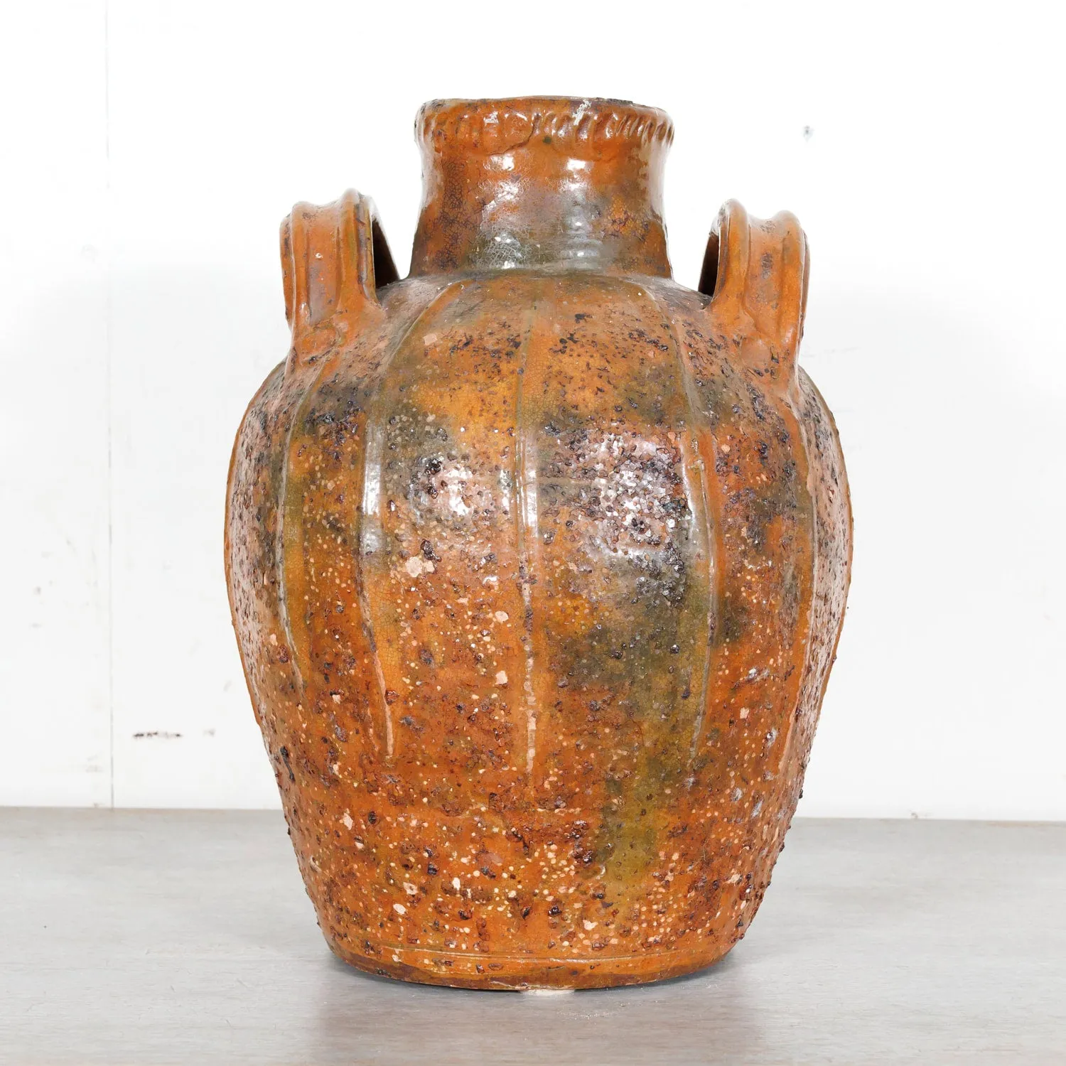 Rare 19th Century French Terracotta Walnut Oil Jug with Orange Glaze