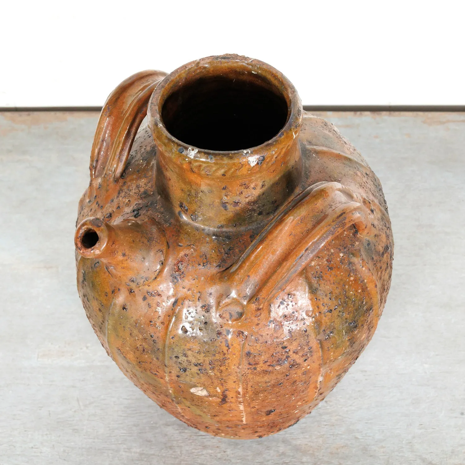 Rare 19th Century French Terracotta Walnut Oil Jug with Orange Glaze